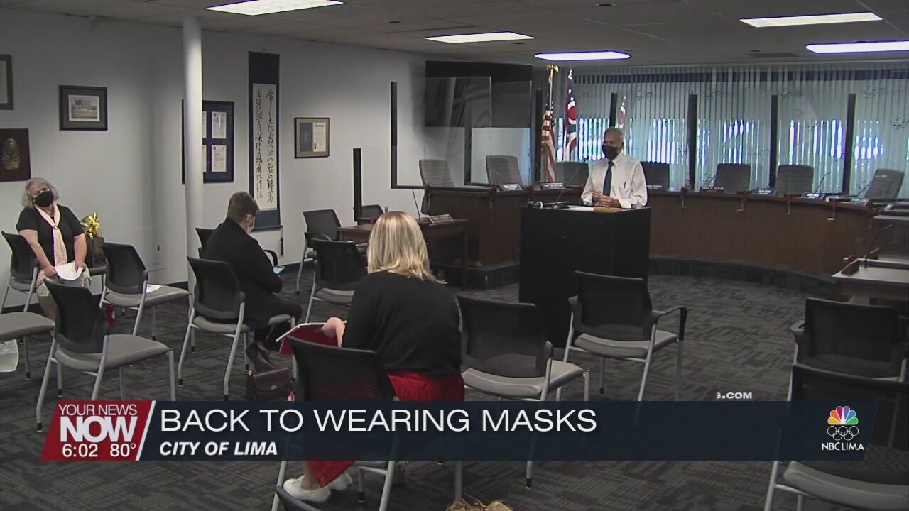 City of Lima following CDC guidelines of masking up to enter buildings